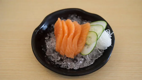 Sliced raw salmon fish or salmon fillet or salmon sashimi as Japanese food restaurant. Asian food Japan sushi restaurant menu