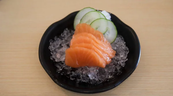Sliced raw salmon fish or salmon fillet or salmon sashimi as Japanese food restaurant. Asian food Japan sushi restaurant menu