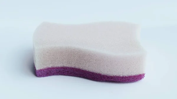 stock image Magenta foam sponge isolated on white for cleaning and washing dishes.