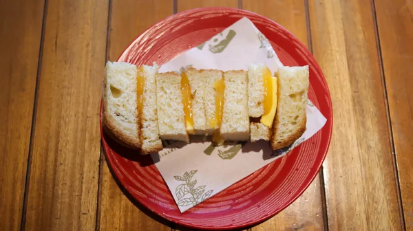 Srikaya toast or Coconut jam bread toast, popular dessert from Malaysians, Indonesians and Singaporeans, a toast bread with kaya jam is a sweet spread made from a base of coconut milk, eggs and sugar.