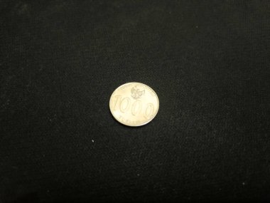 one thousand rupiah Indonesian money coins.