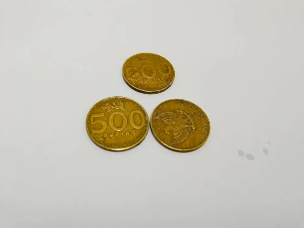 five hundred Indonesian coins money on the white background