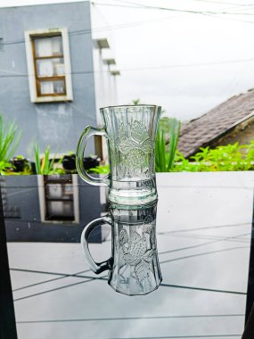 Crystal glass on the glass table