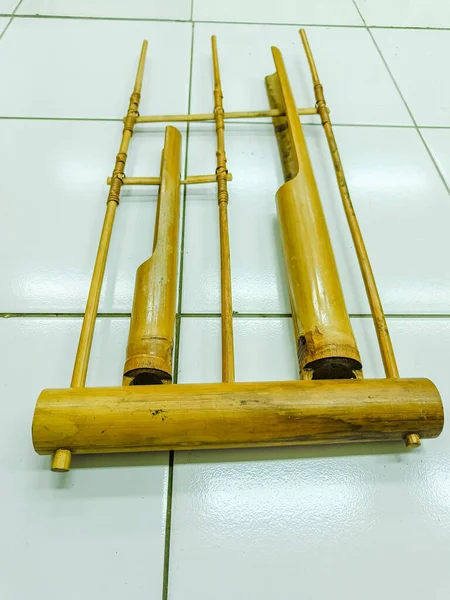 angklung the Sundanese traditional musical instrument made of bamboo. Laying on the floor