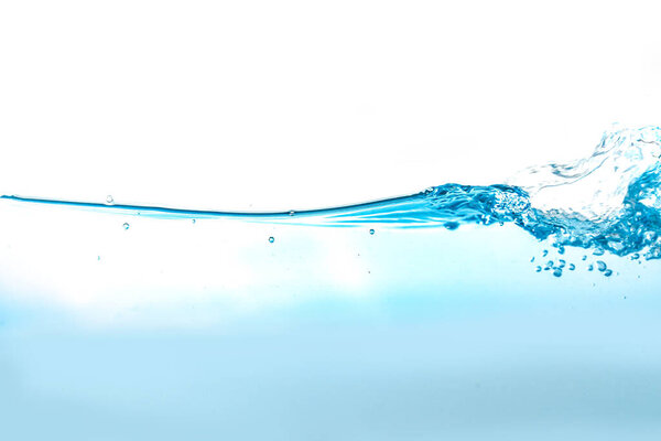 Water splash and air bubbles isolated over white background. Blue water wave abstract background isolated on whit