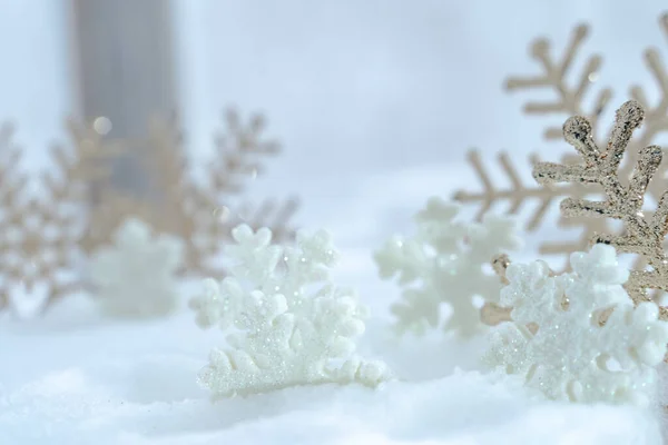 stock image Christmas of  winter - Christmas Snowflakes on snow, Winter holidays concept. White and Golden Snowflakes decorations In Snow Background