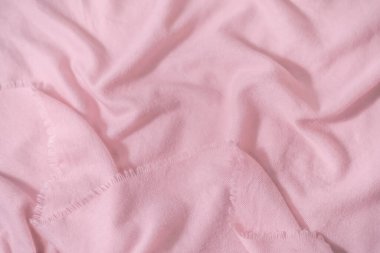 Pembe atkı kumaş dokusu. Kış konsepti Düz konum, üst görünüm, kopyalama alanı