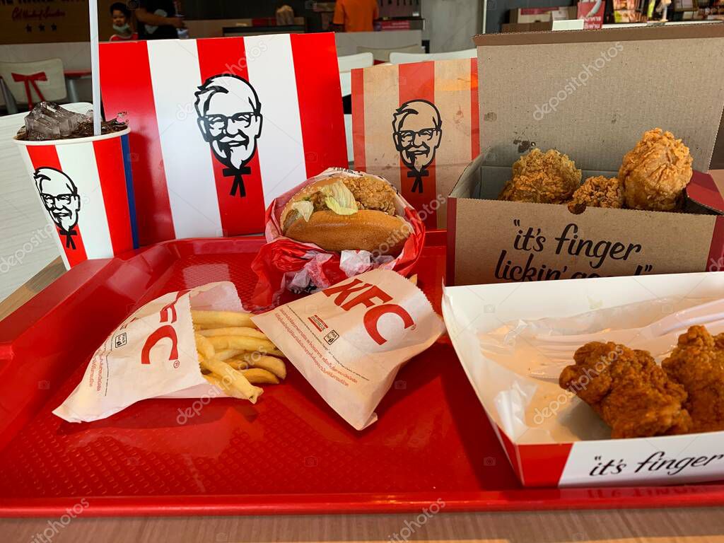 Ayutthaya,Thailand - Apr 06,2022: KFC Hamburger and Fried Chicken set at fast food restaurant Kentucky Fried Chicken (KFC) is a large restaurant chain. At Big C, Wangnoi branch in Thailand - Asia.