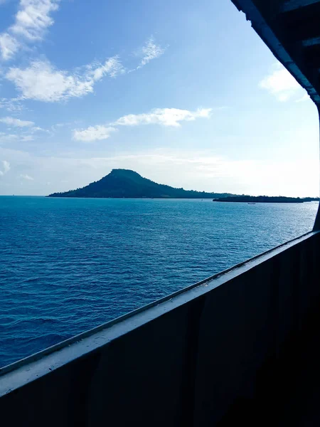 stock image mountain in the middle of the sea