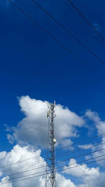 internet tower and sunny cloud blue sky