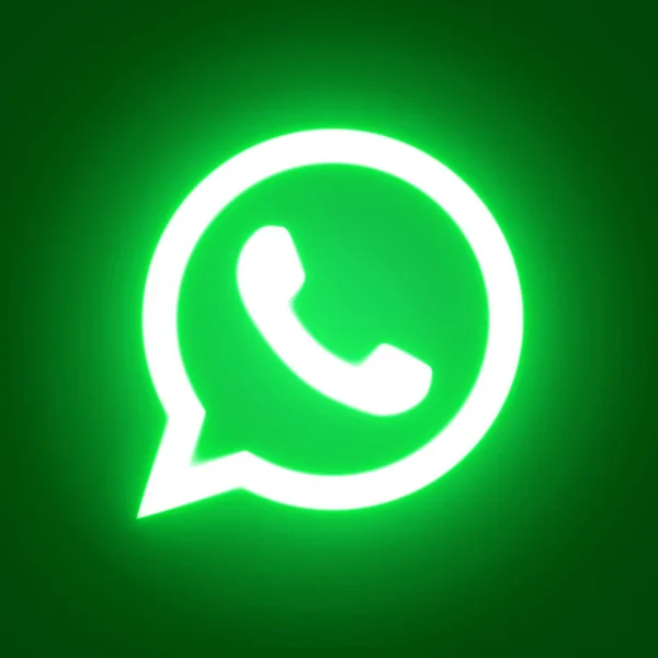 Green neon light WhatsApp logo glow in the dark