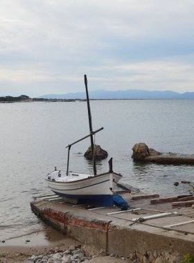 Boat docked at the ramp near the beach
