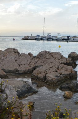Rocks in the foreground of a seascape