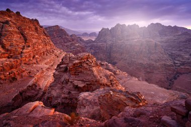 Jordan rock mountain landsce Red rock hills. Petra historical sight - Ad Deir Monastery during the night. Evening light in nature. Travel in Jordan, Arabia in Asia. 