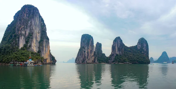 stock image Halong Bay, Vietnam. Scenic view of rock islands and sailboats in the ocean. A beautiful seascape. A UNESCO World Heritage Site. 