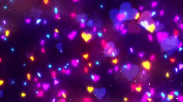 生动活泼的背景 色彩斑斓 晶莹透亮的心形颗粒 完美的情人节录像 无缝线可循环动画 — 图库视频影像