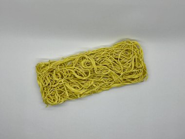 Isolated Yellow Colored Dried Instant Noodle or Raw Noodle