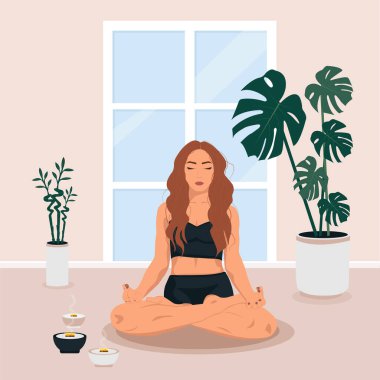 Genç kadın yoga yapıyor, meditasyon yapıyor ve minderin üzerinde nilüfer pozisyonu alıyor. Kadın karakter yoga ve meditasyon yapıyor. Bej ve tasarım odasında yüzü yok..