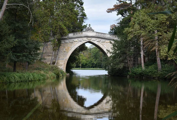 stock image A beautiful old bridge in the park