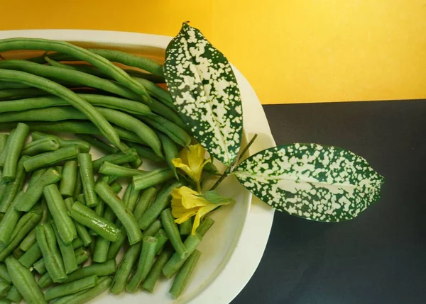 Green beans. One type of vegetable that contains lots of nutrients for the body, especially fiber content, various vitamins and minerals.