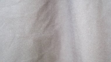 Arka plan olarak hafif kahverengi kumaş doku