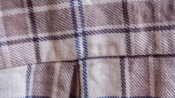 brown fabric texture with gingham as background