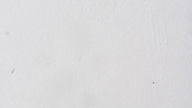 Arka planda beyaz boya olan beton duvar dokusu