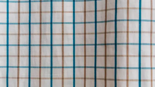 white fabric texture with gingham as background