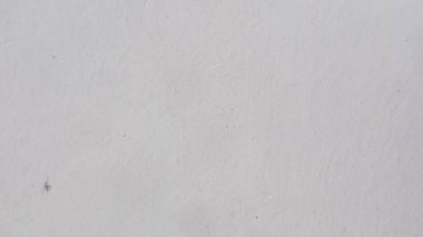 Arka planda beyaz boya olan beton duvar dokusu