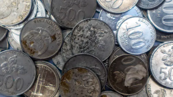 stock image pile of rupiah coins as background