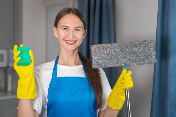 Portrait Young Smiling Woman Uniform Holding Mop Cleaning Sponge Concept — Stock Photo, Image