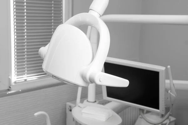 Close-up of the elements of the lighting equipment in the office of the dental clinic.