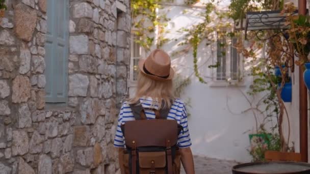 Rear View Young Beautiful Slender Female Tourist Backpack Hat Walking — Stock Video