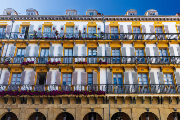 Plaza de la Constitucion, neoclassical square in the Old Town, with numbered balconies for the bullfighting festivals. San Sebastian (Donostia), Gipuzkoa, Basque Country, Northern Spain.
