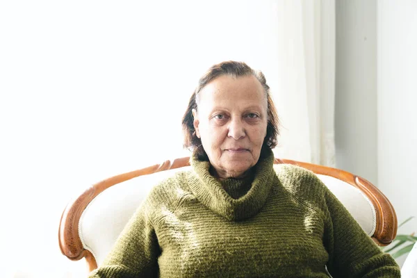 Shot Senior Woman Sitting Alone Her Living Room — Stok fotoğraf