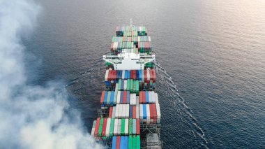 Aerial view of freight ship with cargo containers. clipart