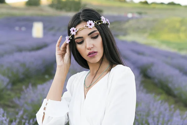 beautiful woman in lavender flowers field