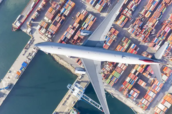 Air Transportation and transit of Container ships loading and unloading, Business logistic import-export transport sea freight with copy space.