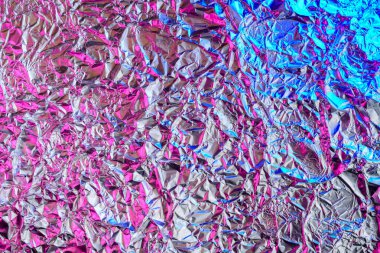 Pembe ve mavi folyo arka plan, dokunun arkaplanı için parlak buruşuk yüzey