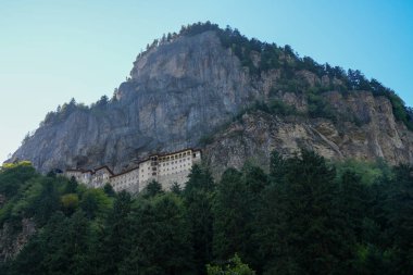 Sumela Monastery behind the tree Place: Trabzon, Turkey clipart