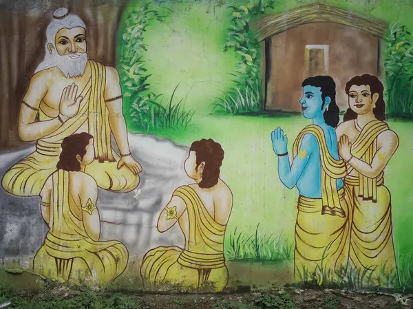 Lord Rama, Lakshmana, Bharata ve Shatrughna 'nın duvar resimleri Ramayana' dan bir sahneyi resmeden Guru Vasishtha 'yı saygıyla dinliyorlardı..
