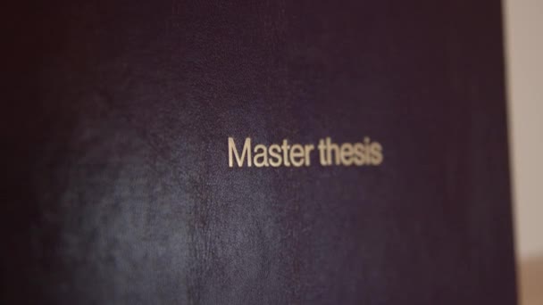Master Thesis Book Cover Golden Letters High Quality Footage — Stock Video