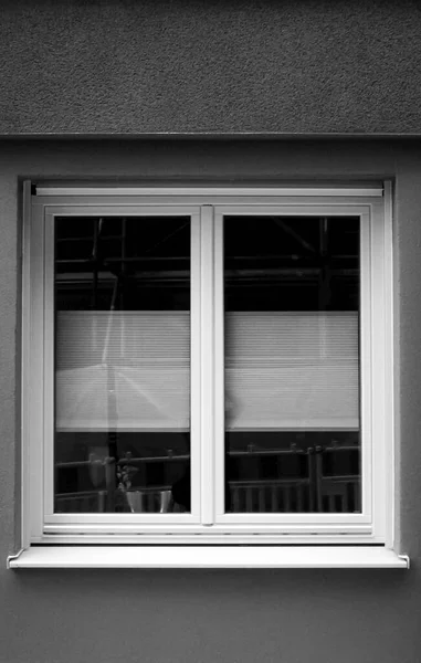 Simple window frame in black and white photography.