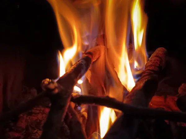 Background texture of burning wood in fireplace