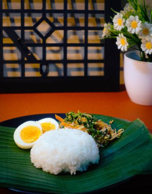 Magelang, Central Java, Indonesia, 01.27.2023, one set menu for Indonesian popular ceremony in Javanese culture called bancaan or slametan .