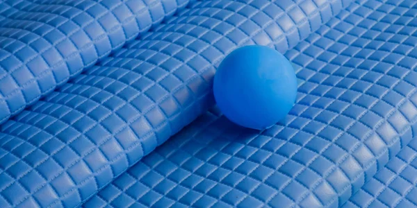 blue ball on  blue square pattern background , abstract blue background.
