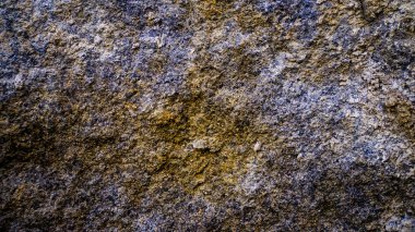 Taşın arkaplan dokusu yakın plan resmi, eşsiz renk, doku ve desen, kaya dokusu grafik tasarımı.