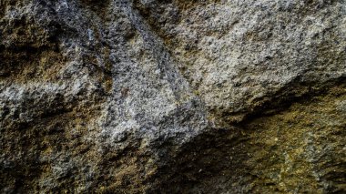 Taşın arkaplan dokusu yakın plan resmi, eşsiz renk, doku ve desen, kaya dokusu grafik tasarımı.