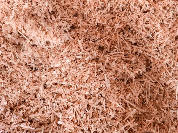 Background texture of sawdust left over small pieces of wood