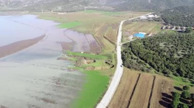 aerial view of underground sinkhole waterfall as water flows video